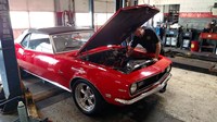 PTAC Technician working on a vehicle