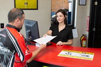 PTAC employee at the counter