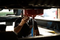 PTAC employee repairing vehicle