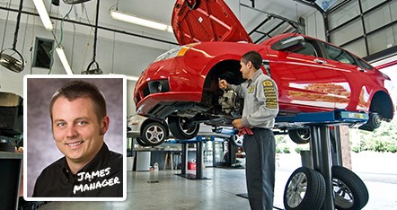 PTAC employee repairing a car